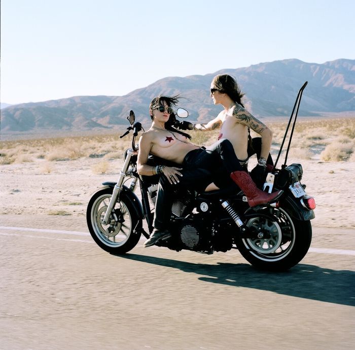 Girls on a motorcycle in Alma Ata