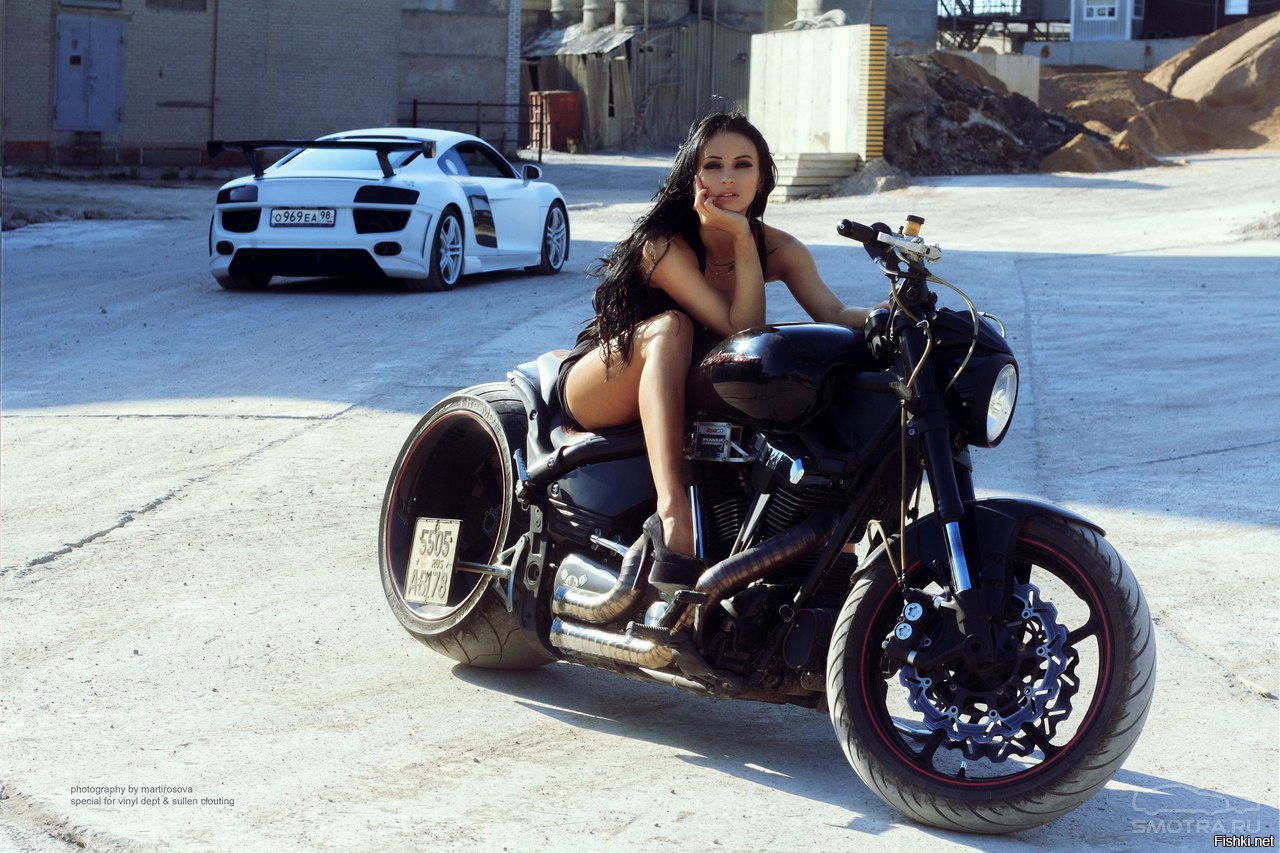 Sexy model Brunettes on a motorcycle in Alma Ata